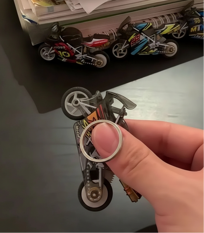 Mini Sparking Bike Toy Keychain – Pull Back, Pop Wheelies & Ignite the Fun