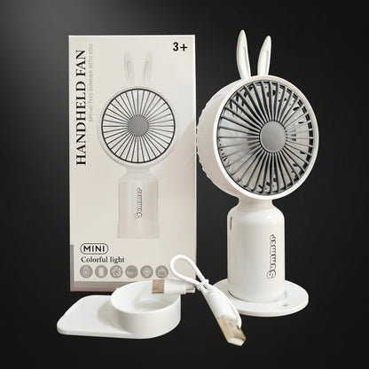 Mini Portable Handheld Fan with Base come with 2 Speed Mod 7 Different Light Use For Office/Market/Travel 1hr Bettery Backup